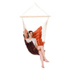 Padded hammock chair with wooden spreader bar